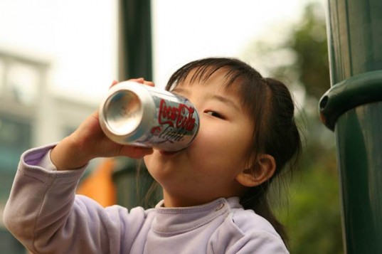 early puberty in girls may be prompted by consumption of soda
