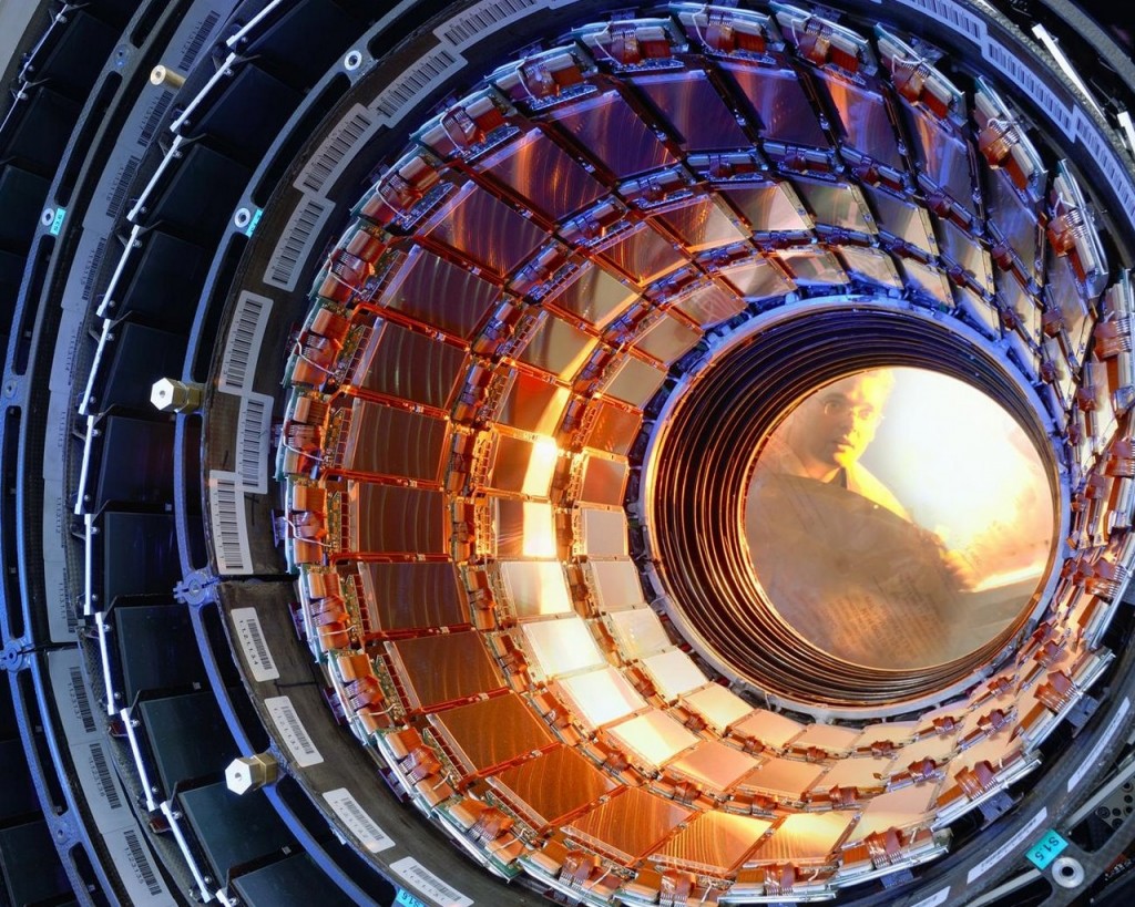 alt="scientists working at the large hadron collider"