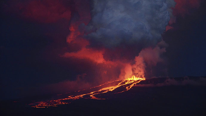 alt="lava flowing down the southern side of the wolf volcano"