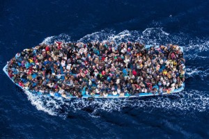 alt="Migrants Boats in Indian Ocean"