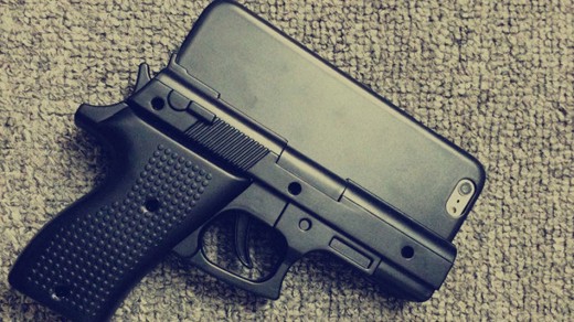 alt="gun shaped iPhone case"