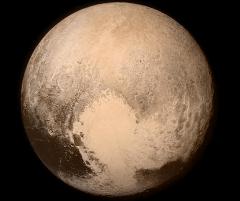 alt="First Shot of Pluto's Surface"