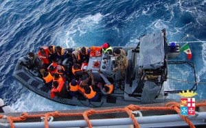 alt="migrants crossing the Mediterranean Sea"