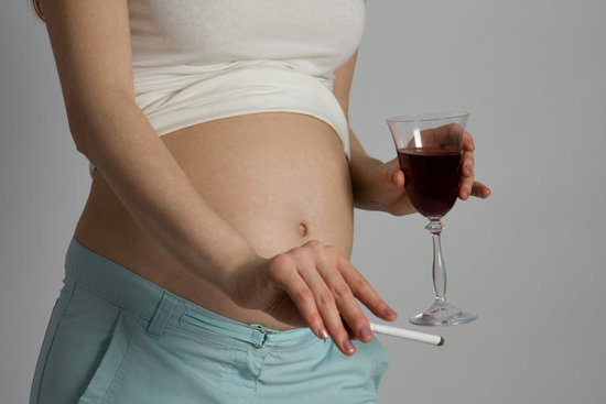 "pregnant woman drinking and smoking"