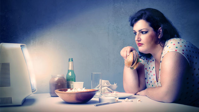 "woman eating at night"