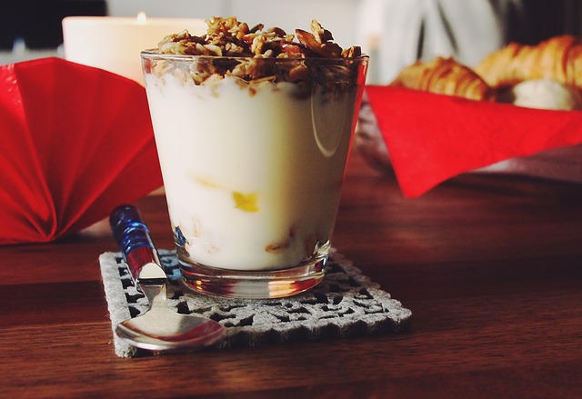 "Cup of yoghurt and granola for breakfast."
