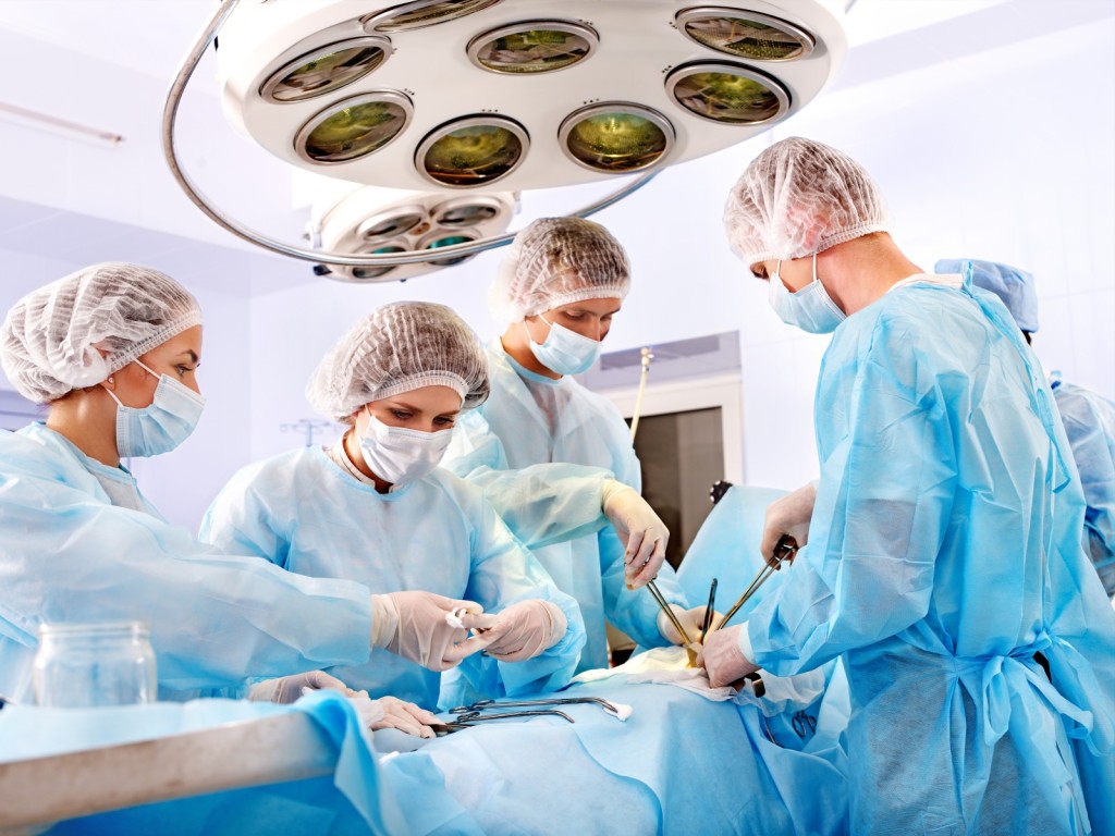 alt="Surgical Team at Work"
