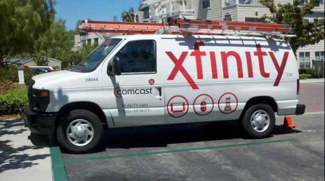 Comcast van bearing Xfinity logo