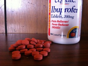 bottle of Ibuprofen and pills