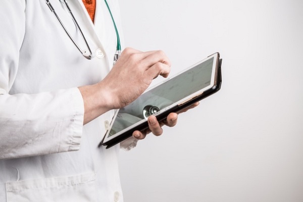 doctor with a tablet in hand