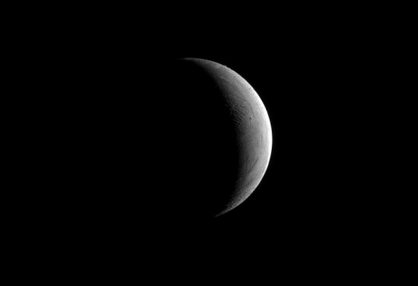 Saturn's moon Enceladus during a crescent phase