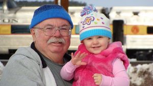 Happy Grandpa and Granddaughter